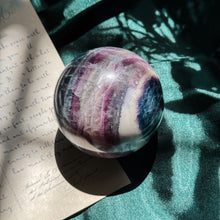 Load image into Gallery viewer, Banded Purple and Blue Galaxy Fluorite sphere
