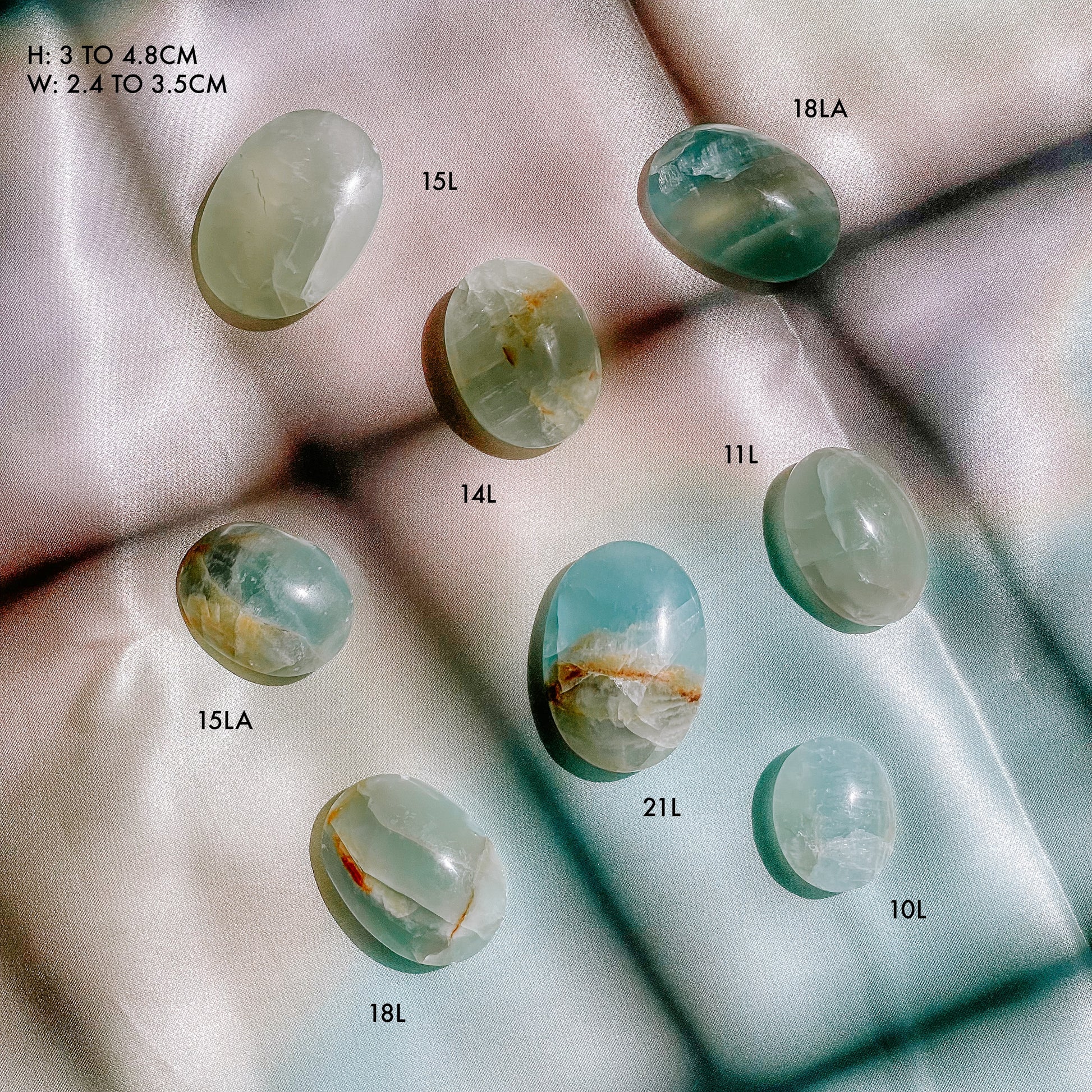 Lemurian Aquatine Calcite Palm Stones