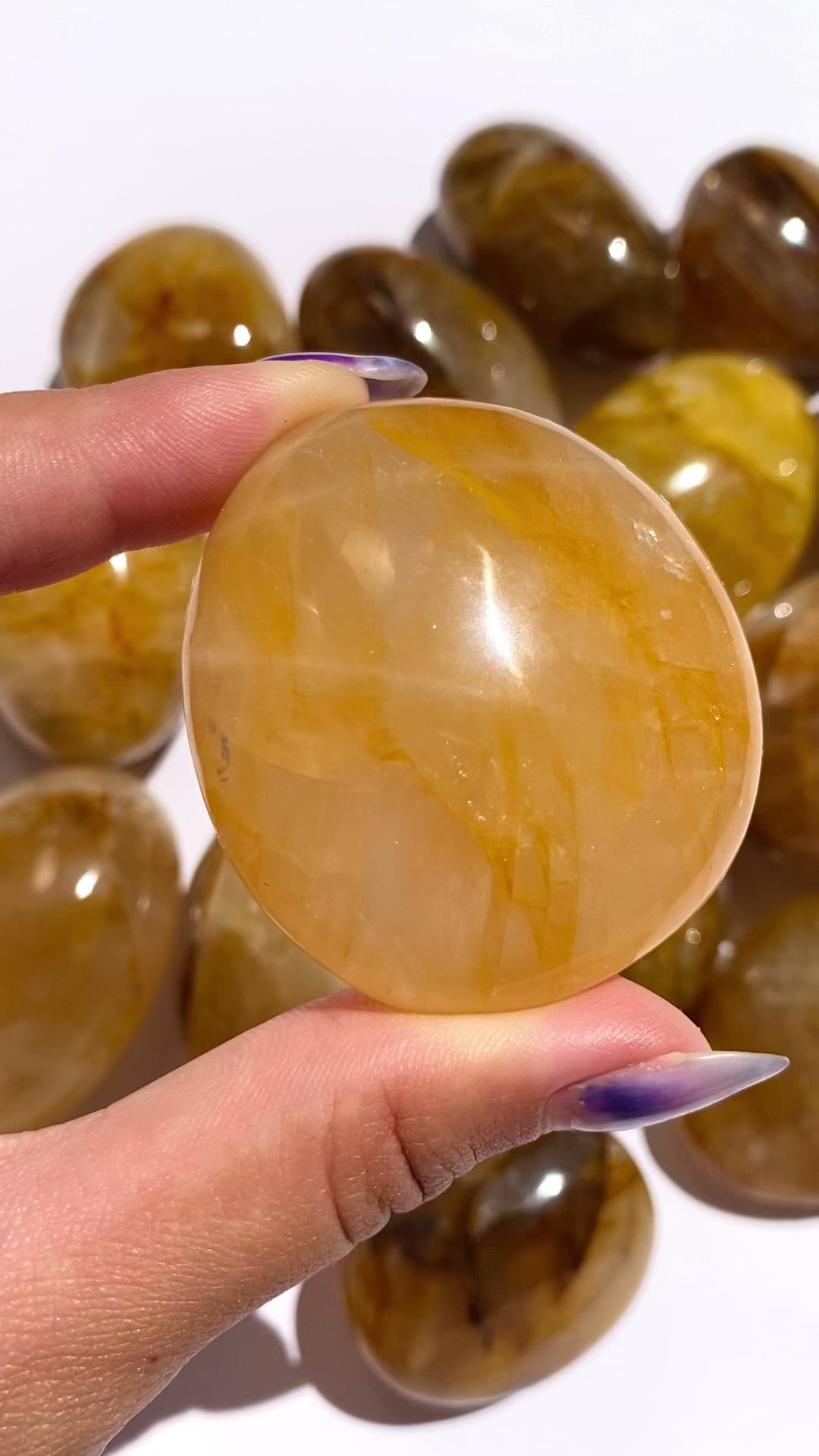 Golden Healer Yellow Hematoid Quartz Palm Stones from Brazil