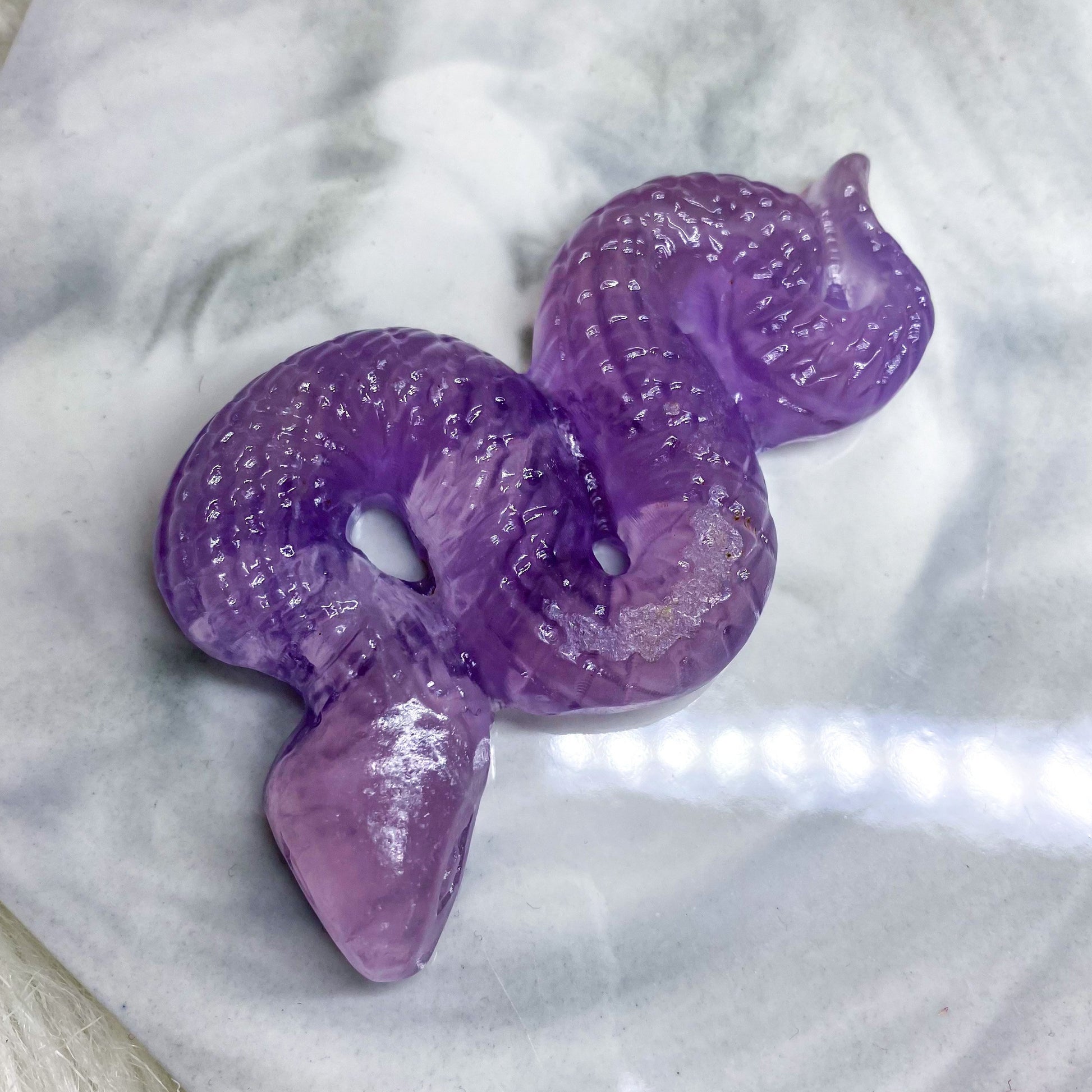 Pink Fluorite Snake Carving