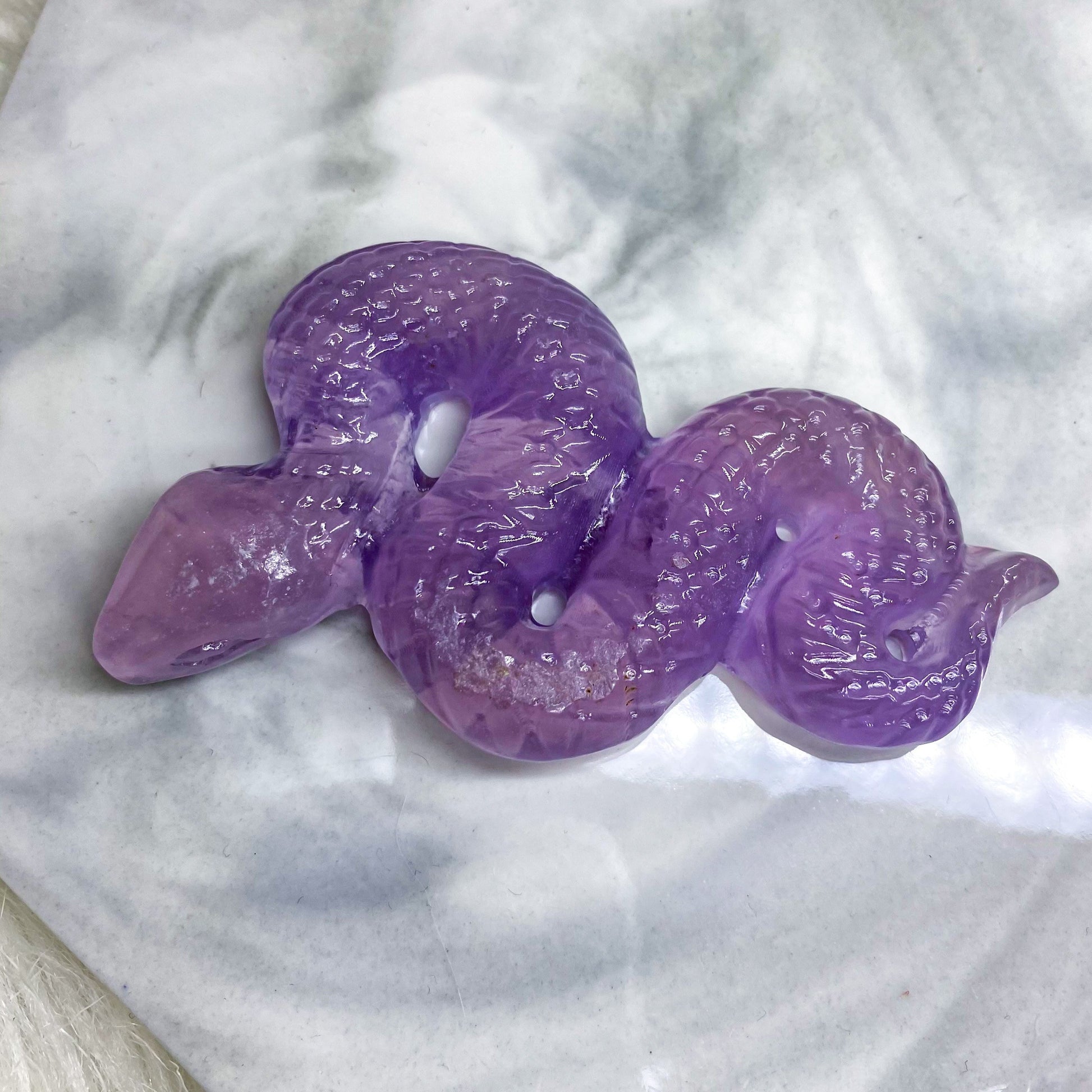 Pink Fluorite Snake Carving